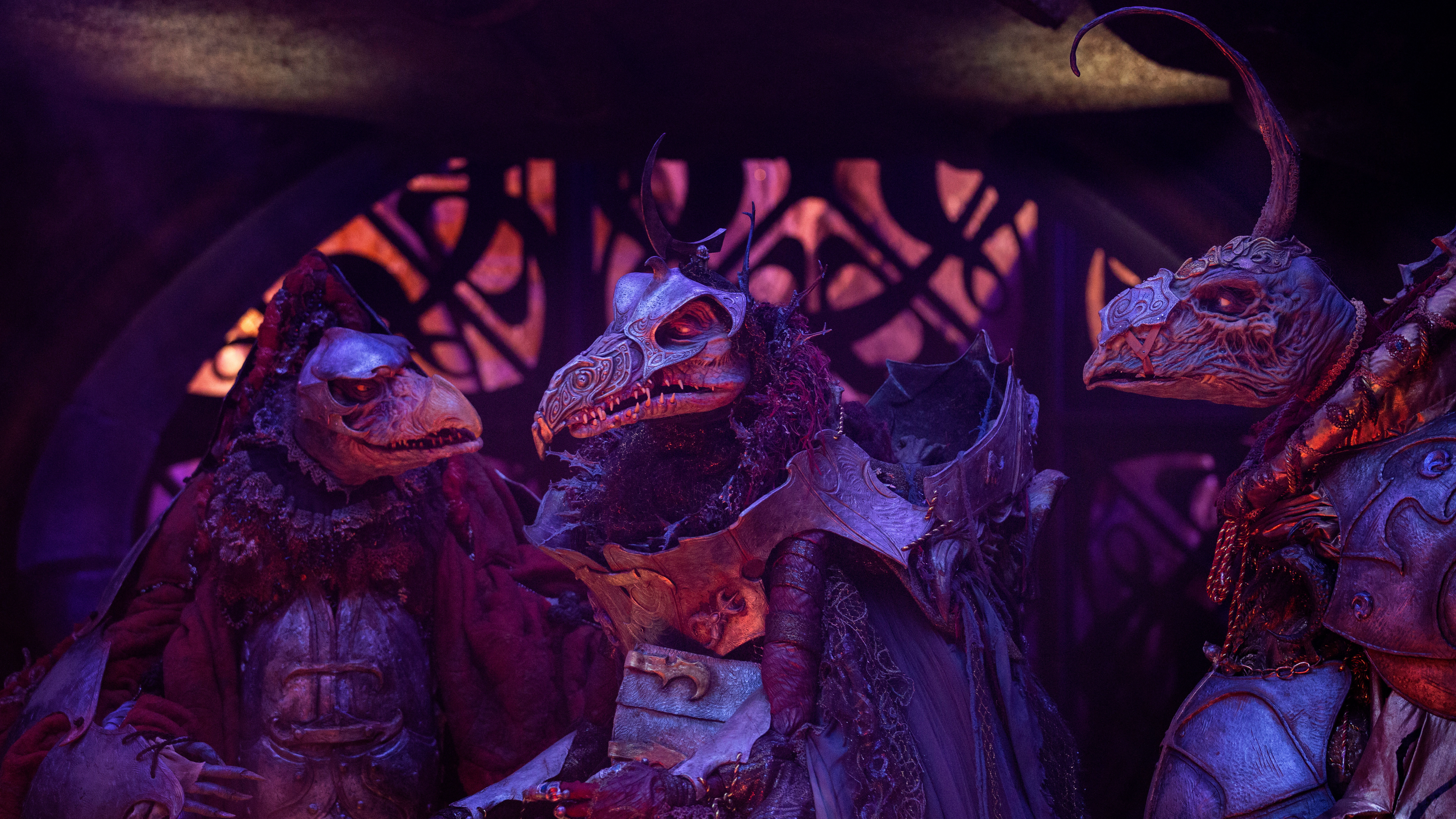 The Emperor (Jason Isaacs) consults with his fellow Skeksis.
